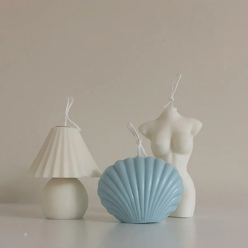 shell candle home decoration showcasing elegant shell-shaped candle and modern decor items.