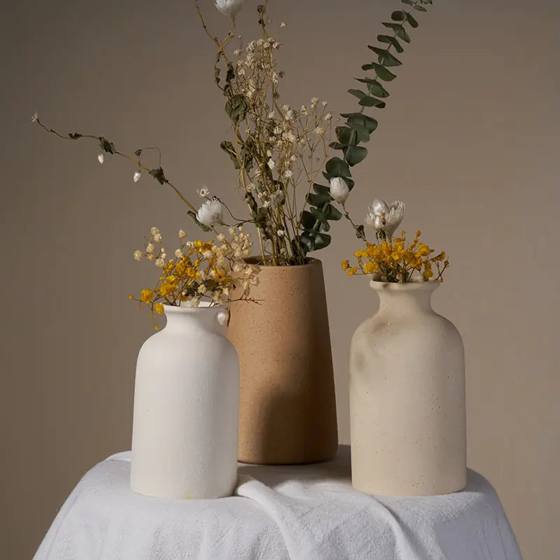 Simple Ceramic Vase quality vase with dried flowers arranged in a minimalistic setting.