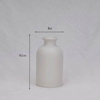 Simple Ceramic Vase quality vase with smooth finish, 14.5 cm tall and 8 cm wide, perfect for home décor.