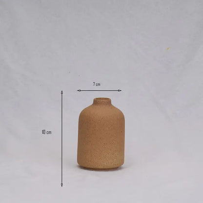 Simple Ceramic Vase quality vase with a minimal design, measuring 10cm in height and 7cm in width.