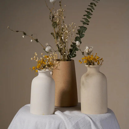 Simple Ceramic Vase quality vase with dried flowers arranged in a minimalistic setting.